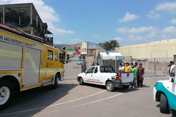 Employees who work in shops at the Durban China mall in Springfield were told to wait outside while firefighters and police inspected the building.