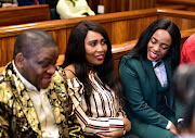 Nigerian Pastor Timothy Omotoso with his two co-accused, Lusanda Solani and Zukiswa Sitho, who are accused of recruiting and grooming girls for the pastor. File Photo.