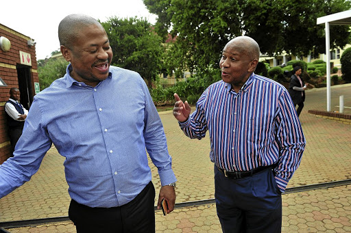 Bobby and Kaizer Motaung share a joke at the at Kaizer Chiefs Village yesterday, where they hosted a Fifa delegation that toured the club's academy and shared ideas about football development.