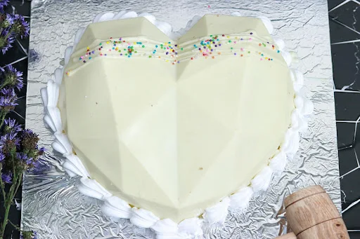 White Pinata Heart Cake