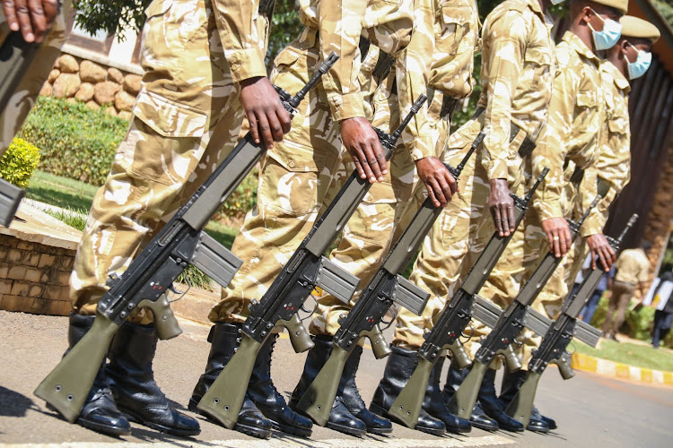 KWS Rangers parade with their rifles