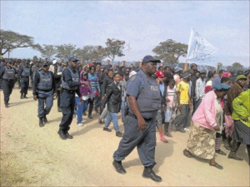 MASS ACTION: Members of the Bushbuckridge Residents Association march against Tintswalo Hospital in Acornhoek and have asked for the intervention of the Mpumalanga health MEC Clifford Mkasi. They claim many people lose their lives in the hospital because of a lack of resources. Photo: Riot Hlatshwayo