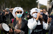 Demonstrators from the hospitality industry protest outside the Houses of Parliament as the coronavirus disease outbreak continues in London Britain on October 19 2020. 
