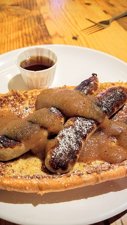 Brunch at Pine Street Market includes OP Wurst with their four breakfast hot dogs, such as this French Toast Dog with two breakfast sausages, French toast bun, apple butter