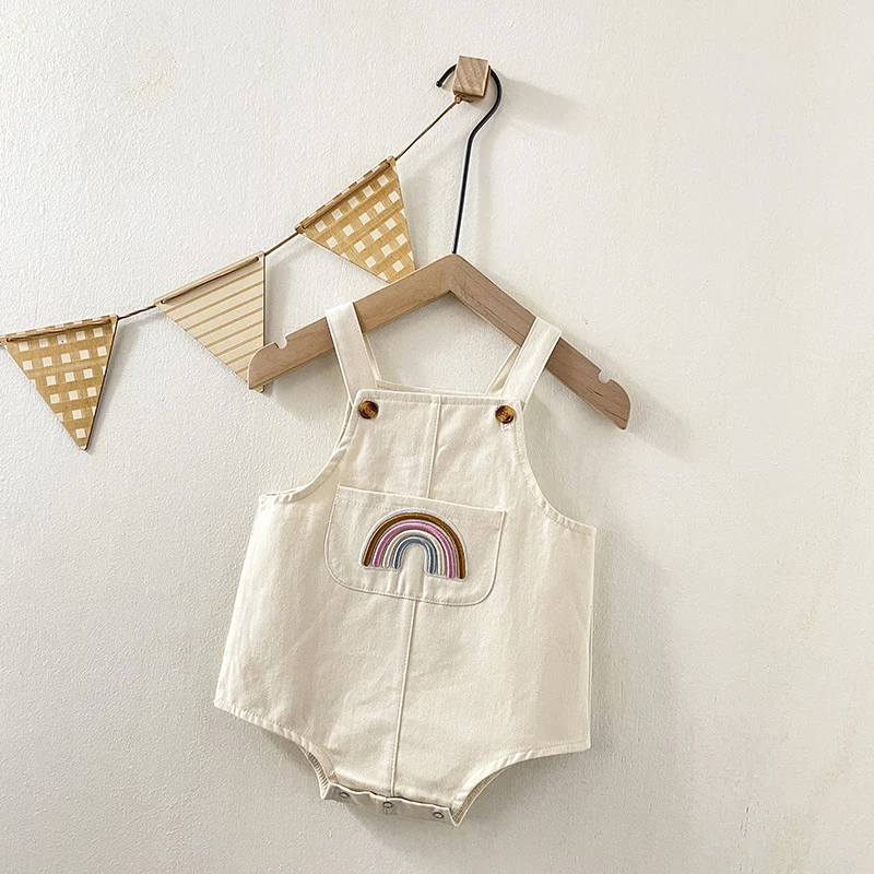 Barboteuse bébé printemps automne style coréen ample arc-en-ciel, combinaison triangle mixte pour sorties, confort et style.