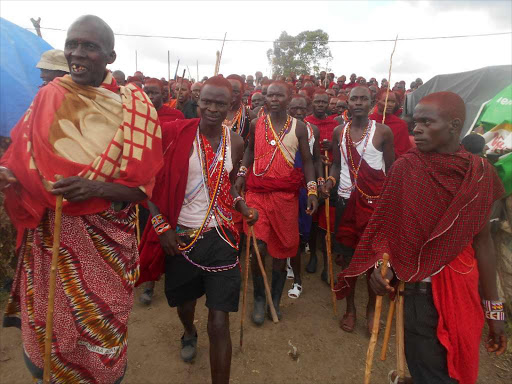 Morans from the Uasin Gishu clan Narok during their graduation ceremony after being in seclusion for one month at a Manyatta at Osinoni in Trans Mara West