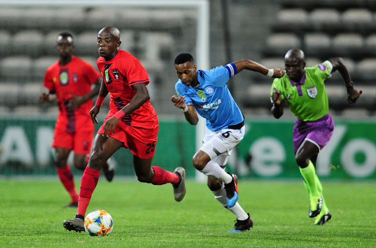 Zakhele Lepasa of TS Galaxy pulls away from Molemo Mekoa of Cape Umoya United FC during the Nedbank Cup quarterfinal game at Athlone Stadium in Cape Town on 27 March 2019 ©