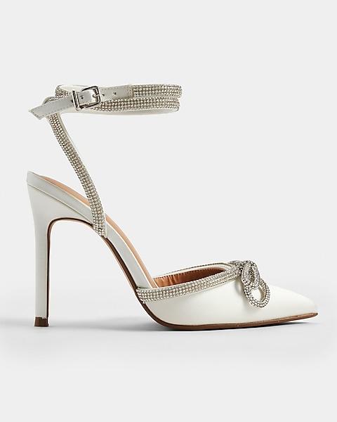 A picture containing high heels, sandal, footwear, basic pump

Description automatically generated