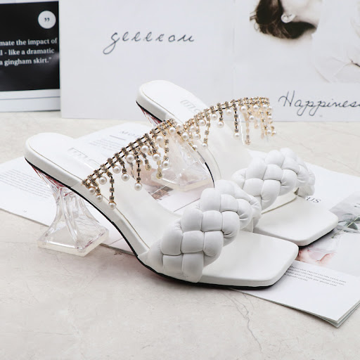 Title 8, Black chunky woven one-line high-heeled sandals...