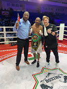 Jackson Chauke is flanked by promoter Ayanda Matiti and manager Damien Durandt