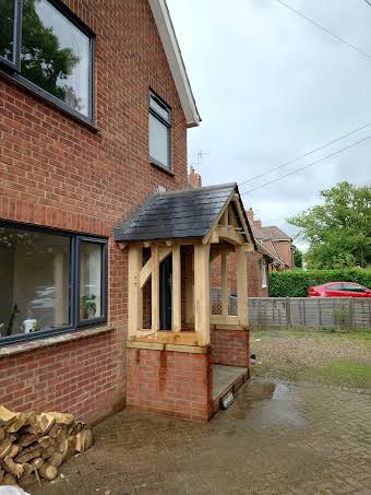 New natural slate porch roof to this oak frame Ashford album cover