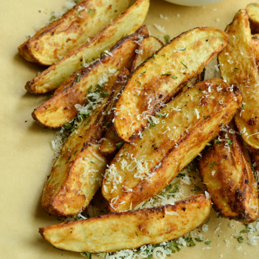 Quick and easy Air Fryer Potato Wedges prepped and in the air-fryer in 5 minutes making them the perfect busy weeknight side or easy appetizer for game day or movie night.