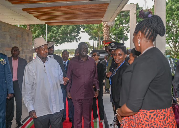 Ugandan President Yoweri Museveni and Azimio la Umoja leader Raila Odinga after his successful three day state visit on May 17, 2024.