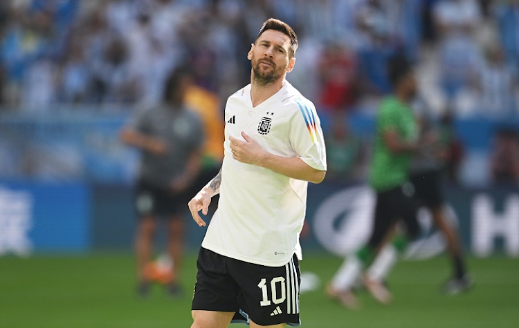 Lionel Messi of Argentina warms up prior to the Fifa World Cup Group C match against Saudi Arabia at Lusail Stadium on November 22 2022.