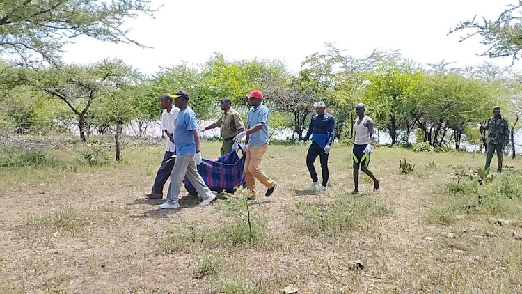 Police and divers after retrieving the body of the class 7 pupil.