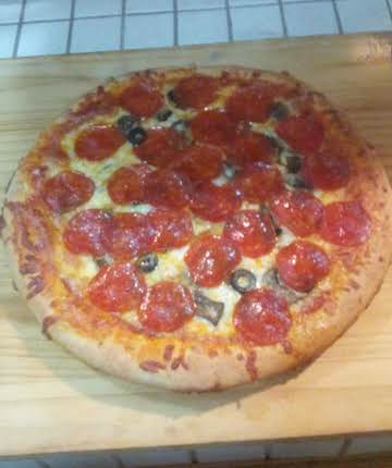 Home-made pizza crust in Cast iron