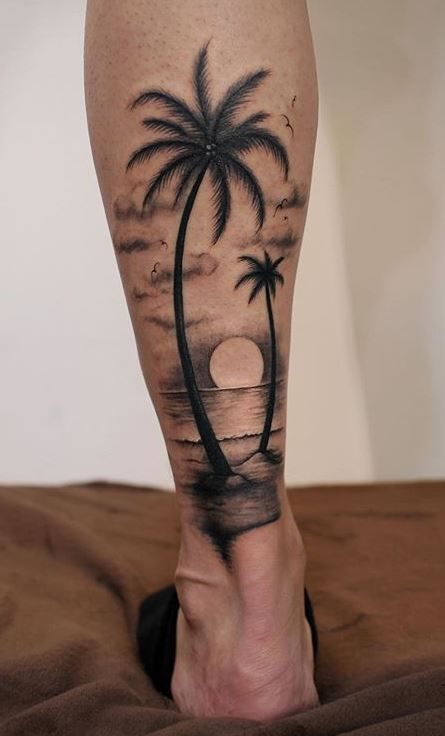 Guy rocks this beautiful palm tree tat on the back of his leg 