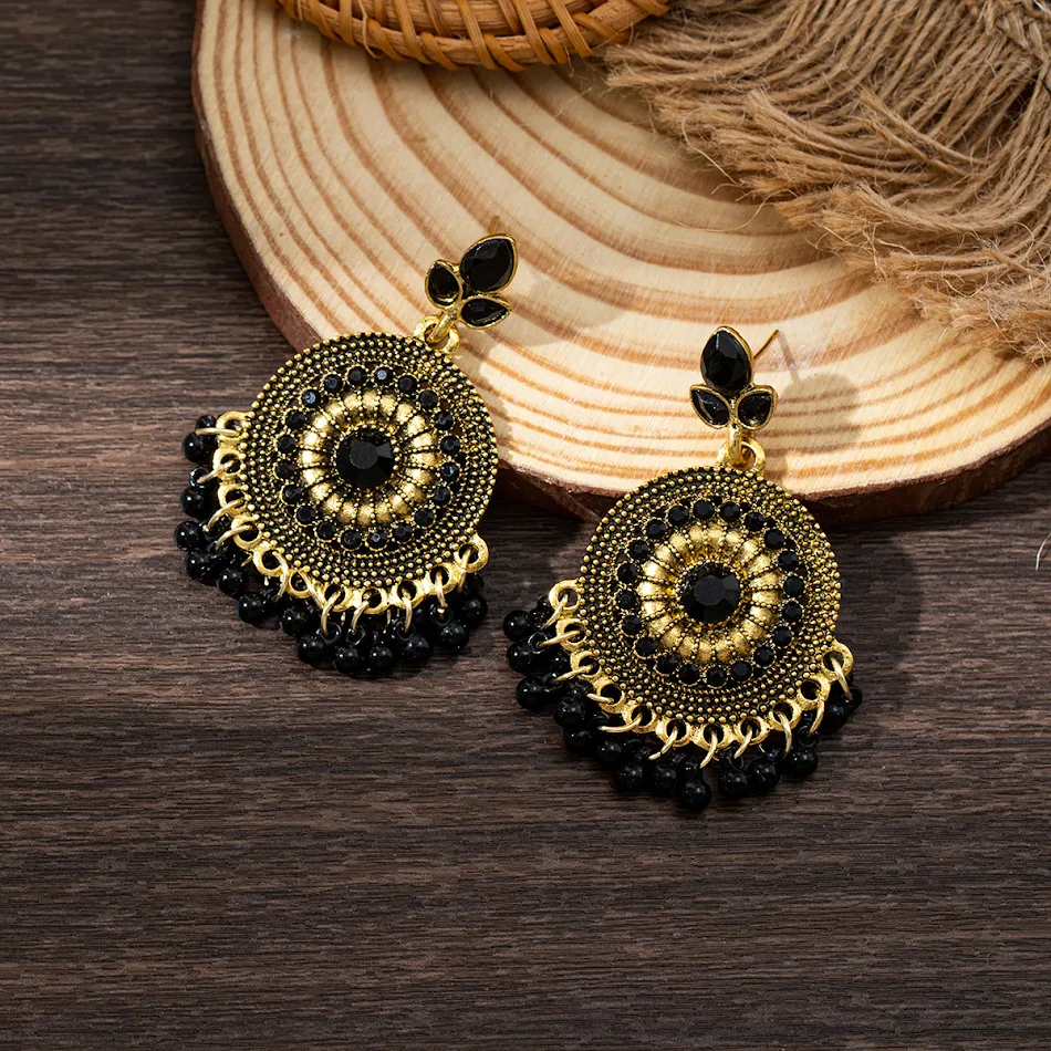 Bohemien oorbellen met belkwastjes, van metaallegering. Mode-ornament voor een stijlvolle uitstraling, perfect voor elke outfit.