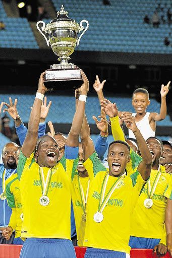 BAFANA BA STYLE: Captain Hlompho Kekana and Themba Zwane celebrate Sundowns's win on Saturday.