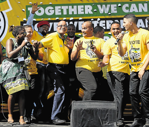 BIRTHDAY BOY: President Jacob Zuma celebrates his birthday with TV soapie actor Sello Maake Ka-Ncube,third from left, as they sing 'Happy Birthday' at a rally in Vygieskraal Stadium, Athlone, yesterday