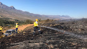 Some of the 120 firefighters deployed to the fire that has been burning above Somerset West since June 8 2022.