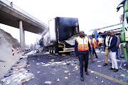 KZN MEC for Transport, Community Safety and Liaison Mxolisi Kaunda arrives at Mooi River Toll Plaza on 30 April 2018 where trucks were torched by protestors the night before. 