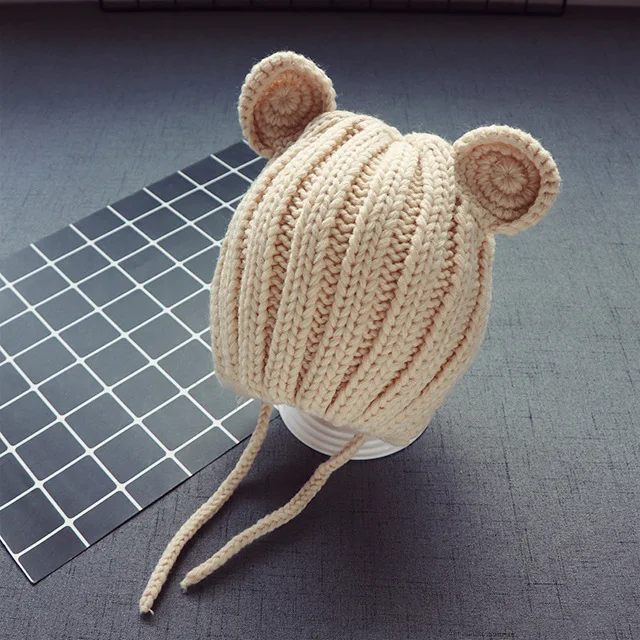 Title 4, Cappello in lana con protezione orecchie per ba...