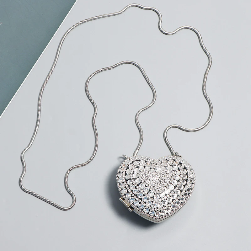 Bolsa feminina transversal com strass e diamantes, estilo discoteca. Ideal para festas e eventos noturnos. Brilhe intensamente!