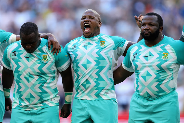 Springboks Trevor Nyakane, Bongi Mbonambi and Ox Nche during the national anthem before the Rugby World Cup match against Scotland at Stade Velodrome in Marseille on Sunday.