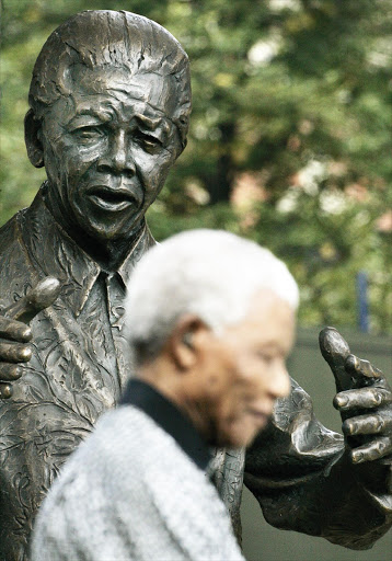 Nelson Mandela at the unveiling of his statue in Trafalgar Square, London, in 2007. File photo