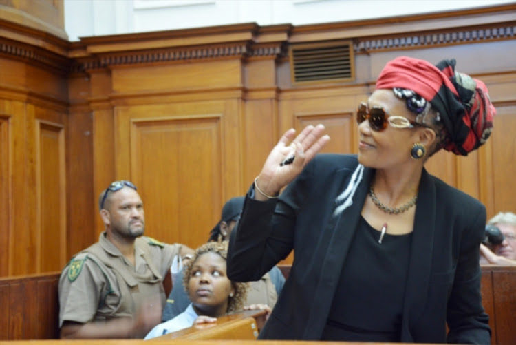 Thandi Maqubela also known as the "black widow" appears at the Cape Town High Court on December 8, 2015 in Cape Town.