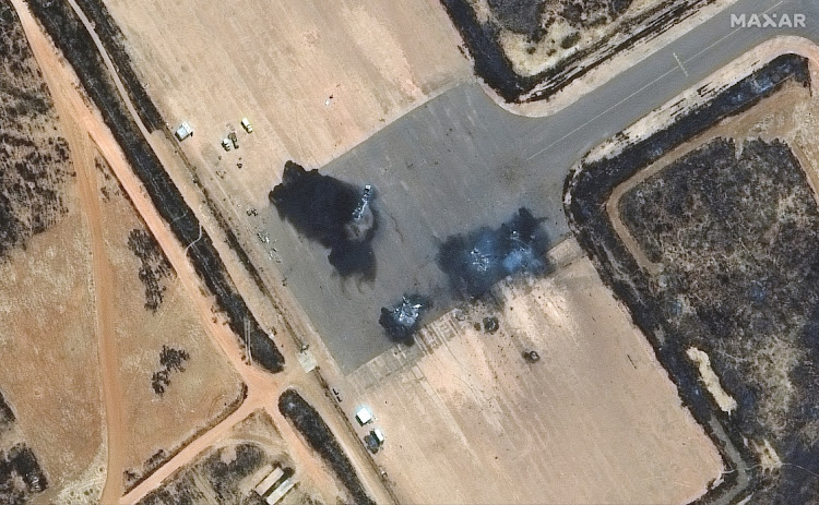 A satellite image shows a close-up of destroyed Su-25 ground attack aircraft at El Obeid airbase in Sudan on April 18 2023.