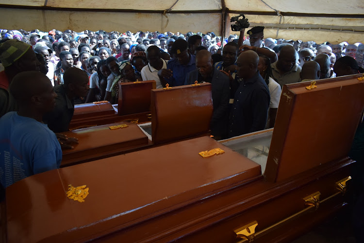 MPs Caroli Omondi (Suba South) , Daniel Manduku (Nyaribari Masaba) and Gideon Ochanda (Bondo) view te bodies of the people killed by floods at Sindo market in Suba South constituency on May 15,2024