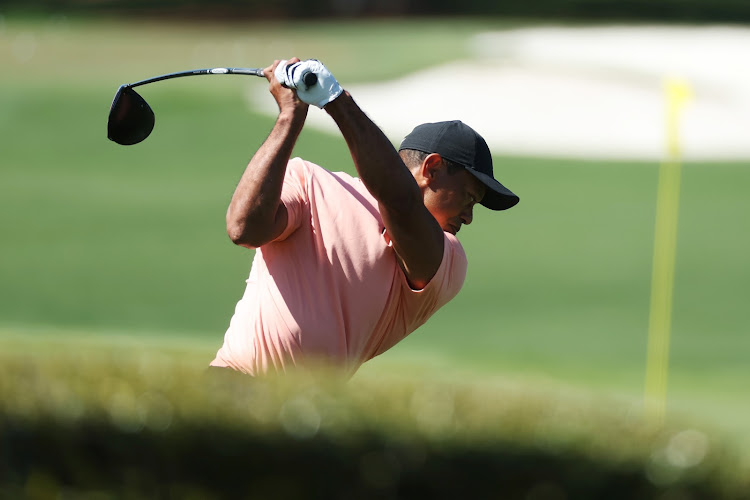 Tiger Woods of the US warms up in the practice area prior to the Masters at Augusta National Golf Club on April 3, 2022 in Augusta