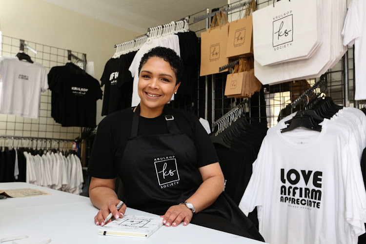 Founder and owner of Krulkop Society brand, Abegail Witbooi, pictured here with some of her merchandise at her showroom in Westering.