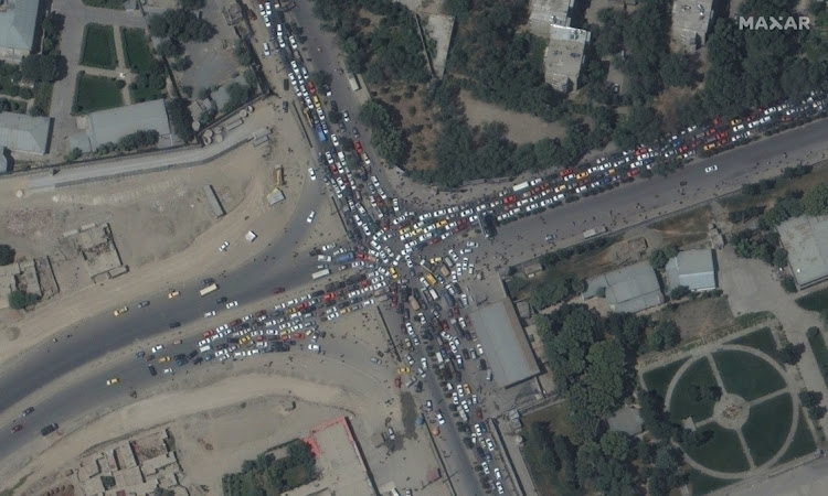 Traffic jam and crowds are seen near Kabul’s airport in Afghanistan on August 16 2021. Picture: SATELLITE IMAGE 2021 MAXAR TECHNOLOGIES/HANDOUT VIA REUTERS