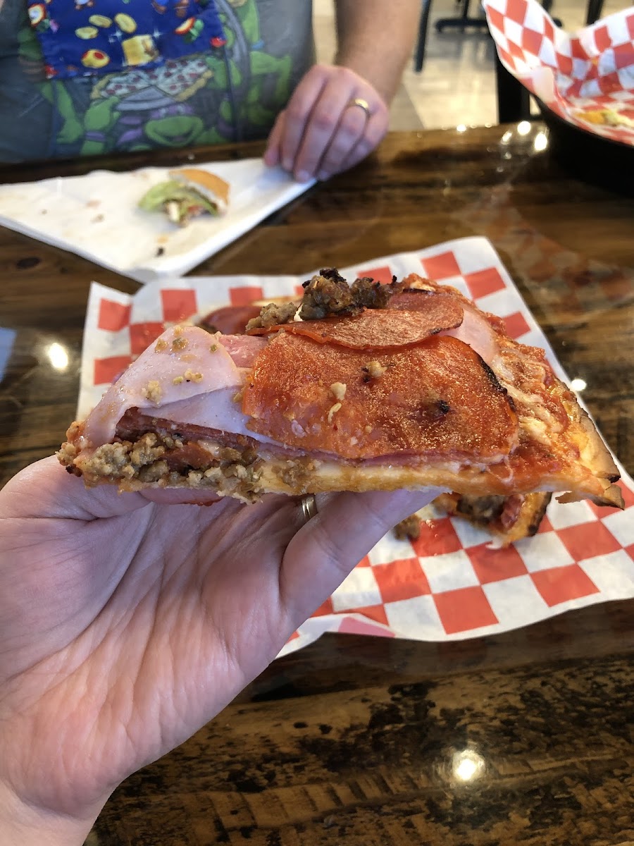 Carnivore pizza. Sadly, the crust was cold in the middle and the texture was rather like a thick tortilla. It was nice near the edges, though.