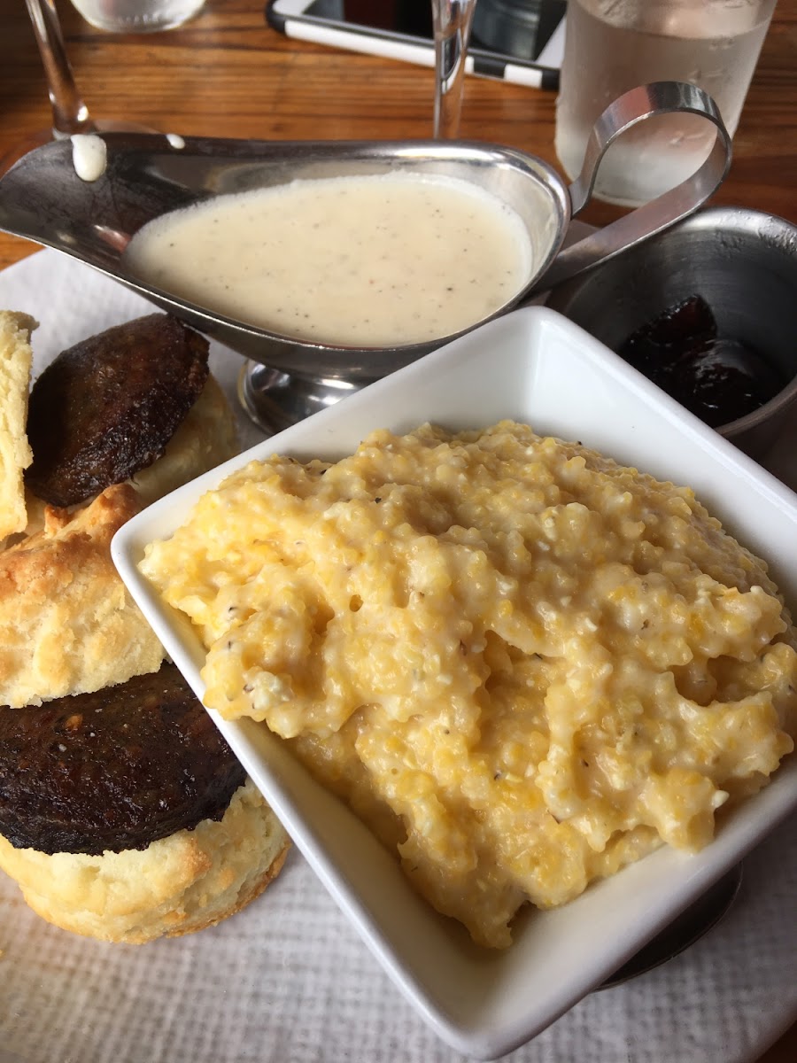 Sausage biscuits and gravy with grits brunch