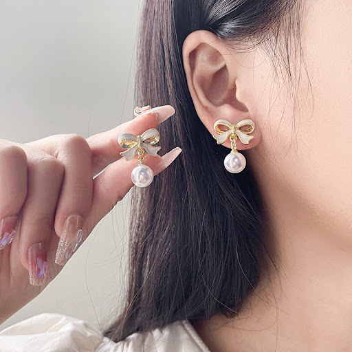 Title 2, Silver Needle Drop Oil Niche Design Ear Studs. ...