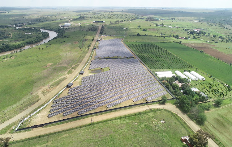 Solar panels shown at a farm in Frankfort, Free State. Regulatory uncertainty can create a frustrating environment for investors, as SA’s experience with the Renewable Energy Independent Power Producer Procurement programme shows, the writer says. Picture: ELIZABETH SEJAKE/GALLO IMAGES