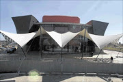 MUSIC AND THEATRE VENUE: Workers put the finishing touches to the newly built Soweto Theatre in Jabulani, Soweto.