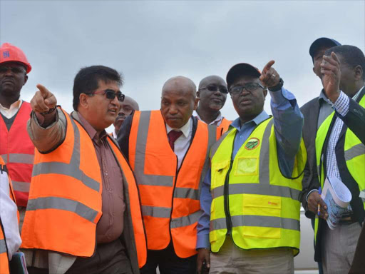 North Imenti MP Rahim Dawood, Meru deputy governor Titus Ntuchiu and Kura director general Silas Kinoti during the inspection tour of Sh. 4.1 billion town bypass, on August 16,2018.Photo Gerald Mutethia