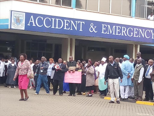 Striking Kenyatta National Hospital workers before they were dispersed on Monday, August 6, 2018. /CAROLYNE KUBWA