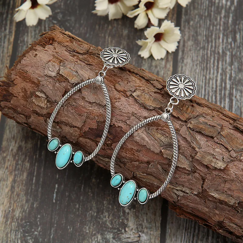 Große Türkis Ohrringe in Tropfenform, Kreisförmig, Natürliche Eleganz. Schmuck für einen lebendigen, anspruchsvollen Look. Perfektes Geschenk.