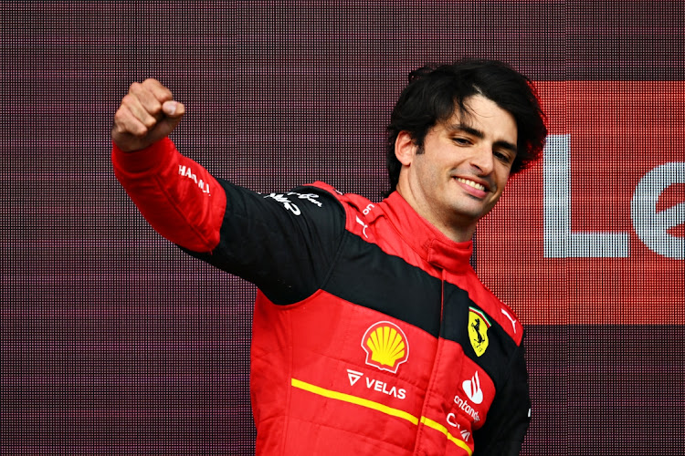 Race winner Carlos Sainz of Spain and Ferrari celebrates on the podium after the the F1 Silverstone race in Northampton, England, July 3 2022. Picture: CLIVE MASON/GETTY IMAGES