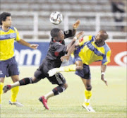 PENALTY TIME: Bucs' Teko Modise is fouled by Fanyana Dhladhla of Maritzburg United resulting in a penalty. Pirates won 2-1. 14/01/2009. Pic. Chris Ricco.  © Backpagepix.