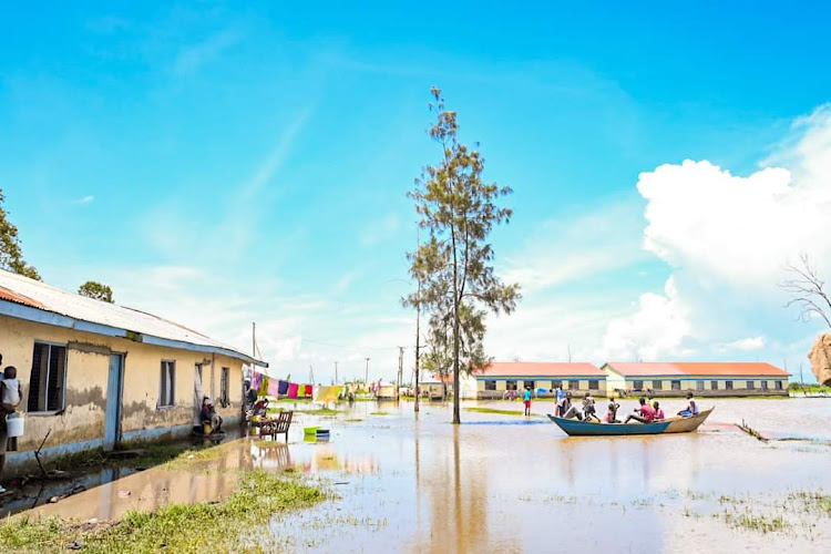 Residents of Kabonyo Kanyagwal evactuated to safety in Nyando, Kisumu county during floods.