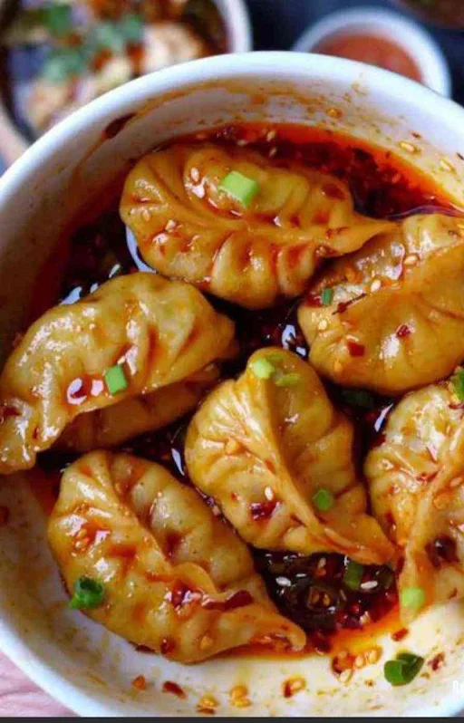 Veg Schezwan Gravy Momos [Regular, 5 Pieces]