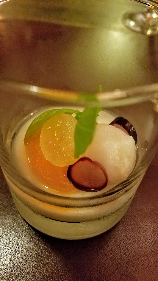 Twisted Filipino December Dinner by Carlo Lamagna Course 8: Ensaladang Prutas, a play on a traditional Chinese almond dessert here with fizzy lychee, grape, mineola, Thai basil, and almond jello