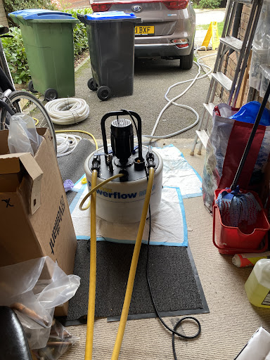 3/5 Powerflushing the old system, removing debris, and improving efficiency.